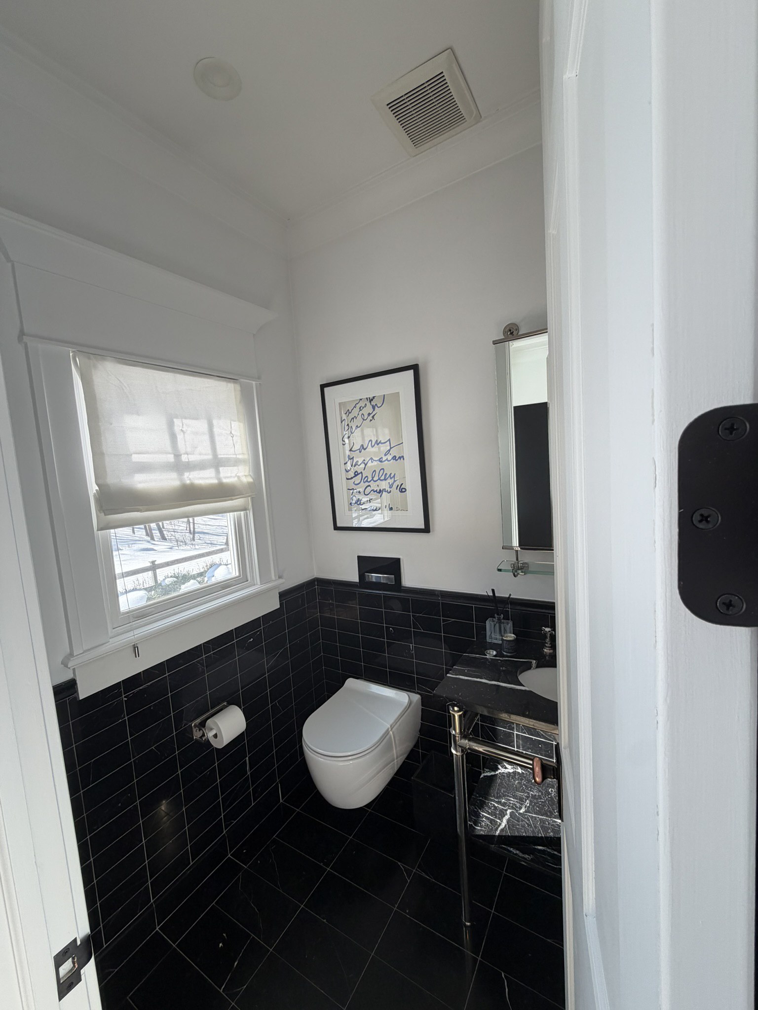 Powder room with modern fixtures