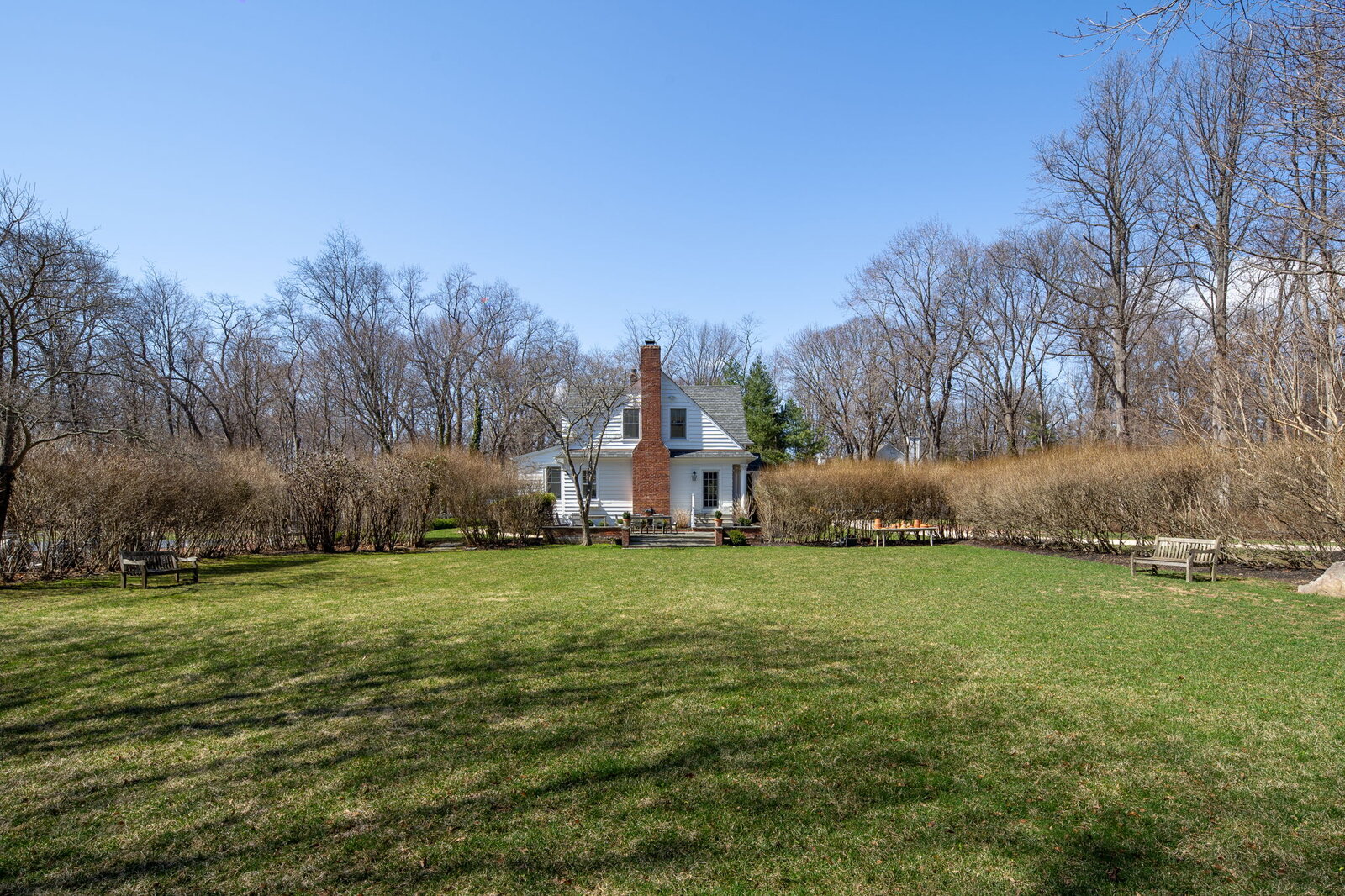 Guest cottage set amid expansive lawn